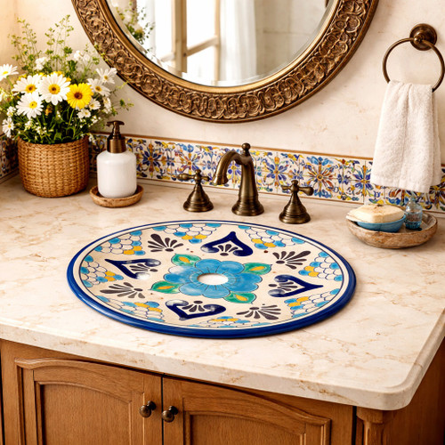 Round talavera bathroom sink blue floral heart design in Mediterranean vanity with bright space and soft tones