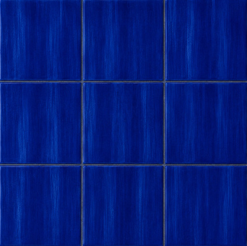 Mexican dark blue tiles with rich cobalt glaze arranged in a 3x3 handcrafted tile layout
