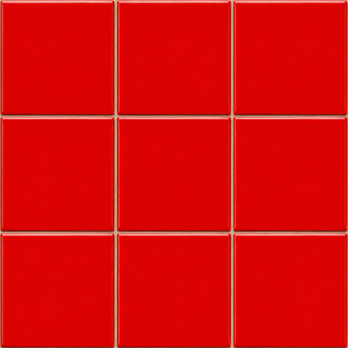 Handmade solid red Mexican talavera tiles for bold vibrant interiors shown as a 3x3 tile installation