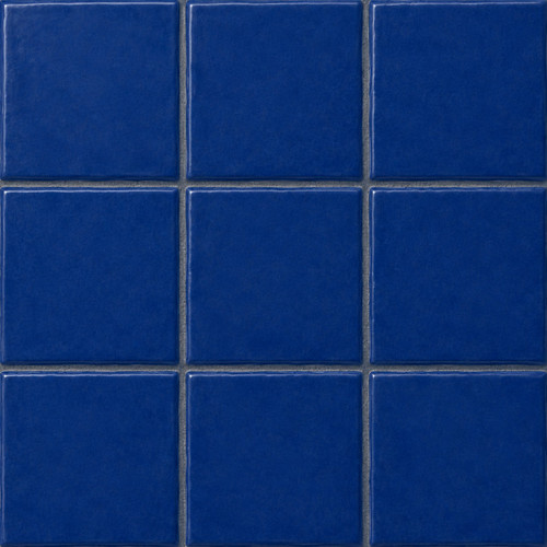 Washed blue Mexican talavera tiles displayed in a handcrafted 3x3 tile layout