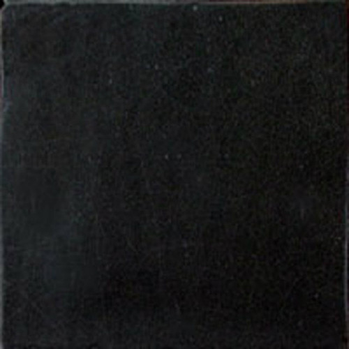 Indigo blue Mexican ceramic tile backsplash with handcrafted glaze in a Mediterranean style kitchen