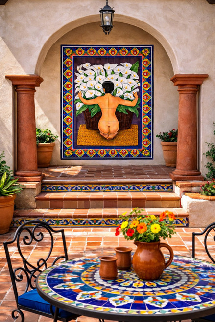 Calla lilies figurative talavera tile mural integrated into Spanish Revival architecture with traditional ceramic detail