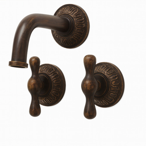 Oxidized brass wall-mount faucet in rustic outdoor style