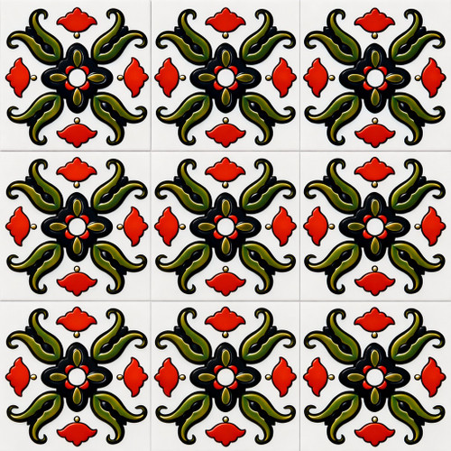 Mexican talavera floral scroll relief tile showing raised floral scroll pattern and bold glazed colors