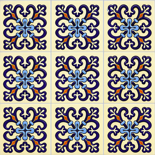 Talavera relief tile with indigo scroll cross shown as a complete nine tile relief set