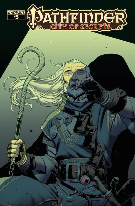 Pathfinder—City of Secrets #3 (Standard Cover—Sean Izaakse) shows a male human wizard holding a crook-shaped staff, his expression one of shocked surprise as a large bulky shadow looms over him.