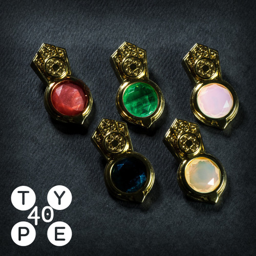 Pathfinder Type40 Aeon Stone Pack photo featuring  five vibrant stones in red, green, pink, blue, and white, each in a compass mount,for use with the Type 40 Wayfinder Compass.
