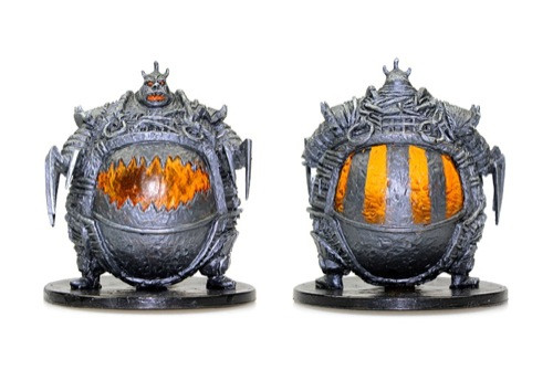 A massive, fire-filled maw splits the belly of this lumbering iron-skinned fiend, whose short arms end in razor-sharp claws. (Front and Rear Views)