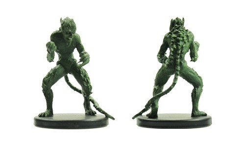 From the tip of its lashing tail to the serrated features of its fang-filled visage, this fiery-eyed sentinel bristles with barbs. (Front and Rear Views)