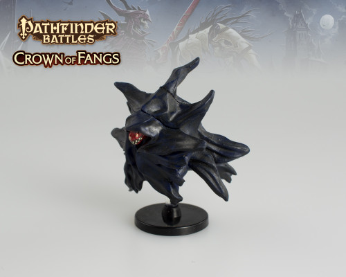 This disembodied phantom wears black robes that swirl around a maw of sharp teeth. (Front View)