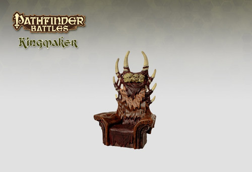 A barbarian throne fitted in leather and furs, horned spikes coming decoratively out of the chair back. (Front View)