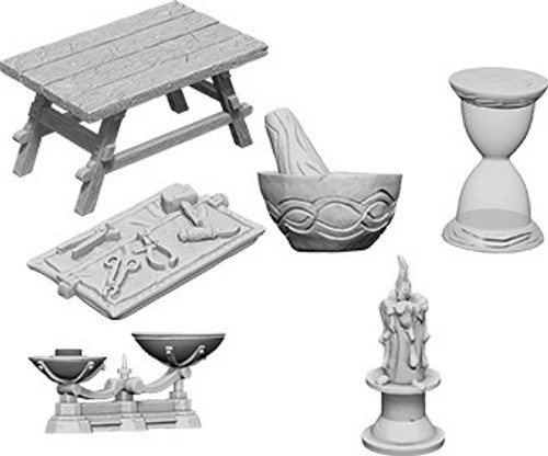An image of the items included in this pack. A workbench (1), a tray of working tools (1), a mortar and pestle (1), an hour glass (1), a set of scales (1) and a hefty candle (1). (Front View)
