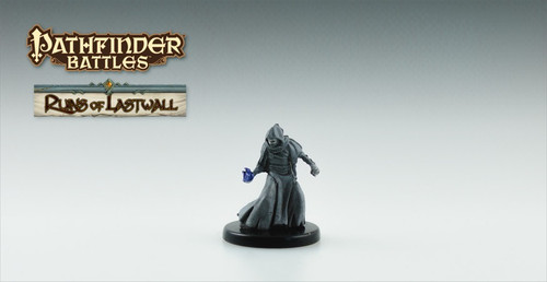 Beneath ragged shreds, this lean figure’s chalky skin darkens to charred hues at the extremities. (Front View)