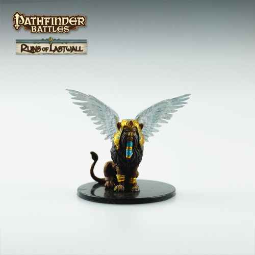 This regal, bird-winged lion has a human’s head, clad in the golden raiment of a powerful pharaoh. He has a thick, dark beard and mane, and the feathers of his wings are a pristine white. (Front View)