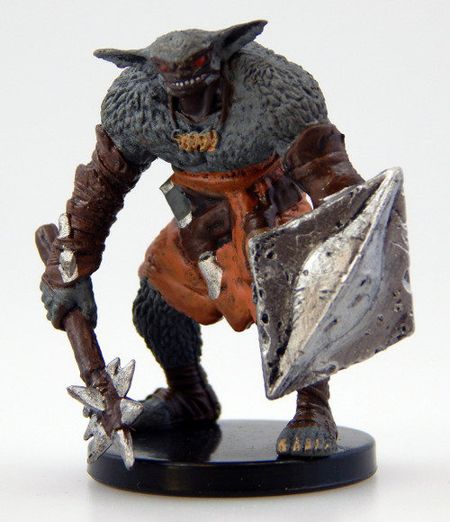 This dark-furred creature carries a spiked morningstar, its tiny, red eyes glittering with the thrill of the coming kill. It has leather arm braces and a leather skirt, its left arm bearing a diamond shaped steel shield. (Front View)