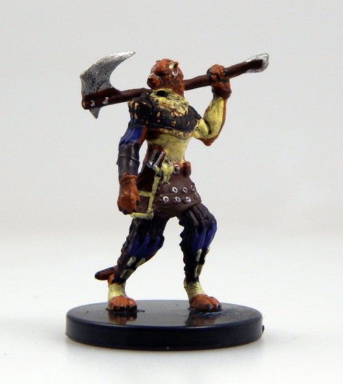 An image of a cheetah-patterned catfolk pouncer in studded leather armor that leaves an exposed, furred midriff. He stands stoically with head turned to look over his right shoulder over which rests a large, hooked axe. (Front View)