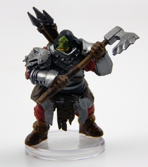 An image of a powerful, broad-shouldered orc heavily armored in gleaming full plate. In their hands they hold a necksplitting axe with a jagged cutting edge. A clutch of javelins sits on their back peeking over their shoulder. (Front View)