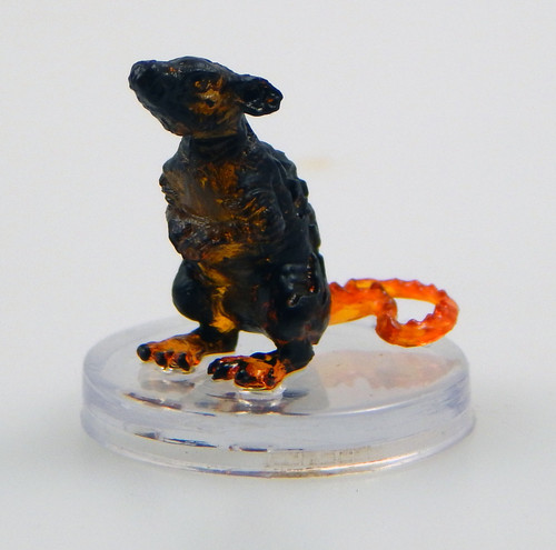These oversized rodents are made of smoldering charcoal and elemental fire, and noxious fumes continually bellow from their flaming flesh. Even other fire elementals find cinder rats unpleasant and are glad when they're summoned away from the Plane of Fire. (Front View)