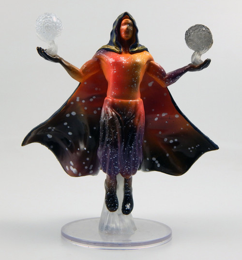 Within the shadows of this vaguely humanoid figure stir swirling colors and spheres, as if it encompassed all the night sky. (Front View)