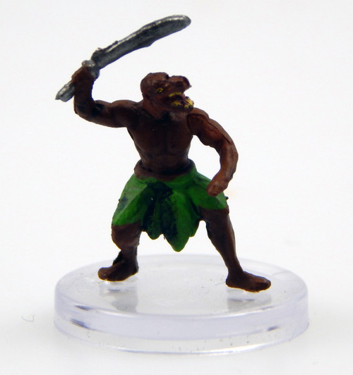 This gnome-sized humanoid’s face is adorned with fiery red eyes and a sharp-toothed mouth that seems too wide for its head. The creature is garbed in leaves and possesses no hair: patches of grass and moss grow from its skin instead. Above its head it swings a crude sword. (Front View)