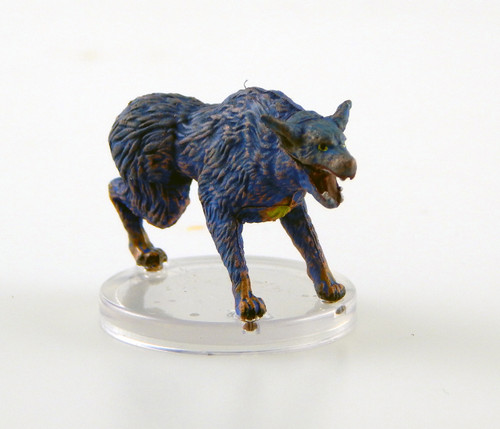 An image of a snarling tashtari. The first glimpse most observers have of a tashtari pack is a far-off twinkling of lights, which is easily mistaken for swamp gas or the glint of moonlight. Produced by the coat of supple filaments that cover a tashtari’s body, these phosphorescent lights facilitate communication, allowing tashtari packs to silently coordinate while searching for prey and setting up ambushes. Tashtaris also use this luminescence for social interactions. (Front View)