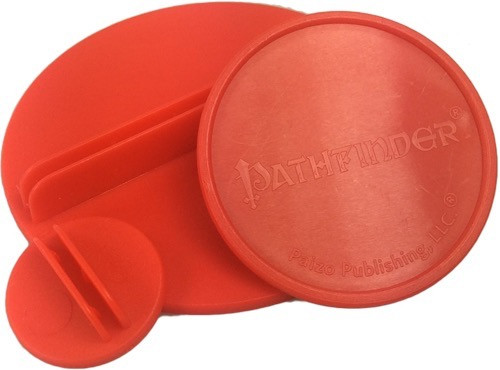 Pathfinder Pawns: Red Bases Medium depicts three different sizes of red circular plastic bases for Pathfinder Pawns, stacked in a small pile—two showing the slot to hold a pawn, and one upside down to show the Pathfinder logo on the underside.