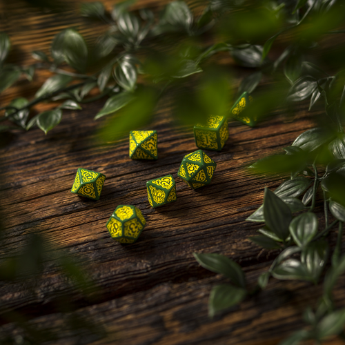 Green and yellow dice array arrayed around green foliage. 