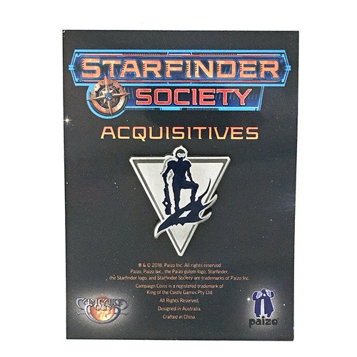 Starfinder Society Faction Pin: Acquisitives shows a black cardboard card on which is affixed a triangular silver pin on which a black image of a humanoid in a spacesuit stands over a stylized dragon skull at their feet, all above a few lines of descriptive text on the cardboard below.