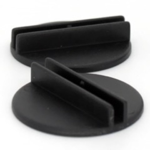 Pathfinder Pawns: Huge Bases (5) depicts a pair of black circular plastic bases for Pathfinder Pawns, standing side by side and showing the slot to hold a pawn.