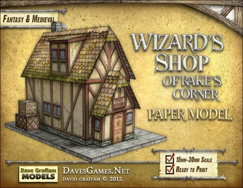 15mm-30mm scale Wizard's Shop of Rake's Corner paper model, beige and brown medieval building with mossy roof, on grey stone sidewalk, designed with cardstock paper, featuring multiple windows and door, suitable for tabletop gaming scale models.