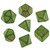 Photo of 7 polyhedral dice in green with gold "Asian-style" embellishments and numbers.
