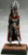 An image of a fully built and painted Pathfinder leader, wearing tight clothes, a cloak, and a papally large headdress. (Front View)