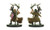 An image of a disgruntled shaman in tattered robes. He holds a gnarled staff from which hangs a small monkey. (Front and Rear Views)