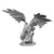 An image of an angry silver dragon crawling down over the rocks, wings flared and maw wide. (Front View)