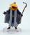Priests of Senghor strive to keep even the smallest of shrines to the most menial of deities in working condition, respecting the importance they have on everyday aspects of city life. This priest wears zig-zagged blue robes with a bright yellow belt and collar, a wide-brimmed golden straw hat on his head. Around his shoulders and draped over his body he wears a long white cape. In his hand he caries a staff that ends in a short crook. (Front View)