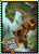 GameMastery Chase Cards Deck sample card back depicts a hero carrying a treasure chest as he runs away through the woods while a huge green dragon chases him; a sign down below with arrows pointing in two directions has the “Chase Cards” logo on it.