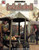 Penumbra: Seven Civilizations d20 PDF cover featuring Rick Neal and Keith Baker's sourcebook for fantasy games, a medieval market scene with an orc-like vendor, sword, and various produce.