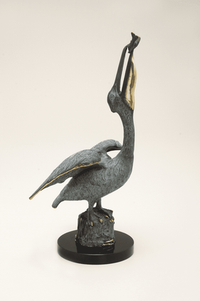 Pelican Eating Fish Sculpture by SPI Home