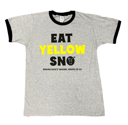 Flat lay photo of a gray ringer t-shirt with black trim, featuring the bold text: 'EAT YELLOW SNO'.