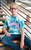 A kid in a Youth Teal Tie-Dye Tee