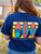 Back of a woman in a Color Blocked True Navy Tee
