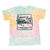 Tie-dye t-shirt in pastel colors (blue, pink, and yellow) featuring a teal graphic with the text 'Bahama Buck's' and the slogan 'FLAVOR YOUR LIFE' surrounding an illustration of a snow-shack building.