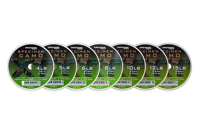 Drennan International Drennan Specimen Camo XT - 100m, image of multiple spools of fishing line in different weight capacities from 4lb to 15lb with camouflage design and product labeling.