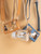 0125-BAG-LTHR-CLUTCH-STDM-CRM