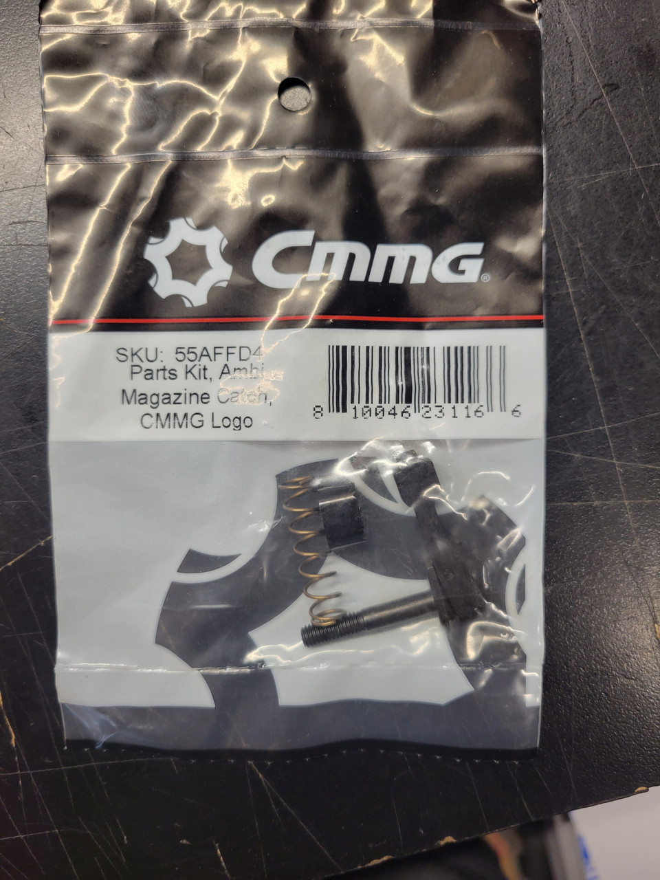 CMMG Ambi Mag Catch with button, spring