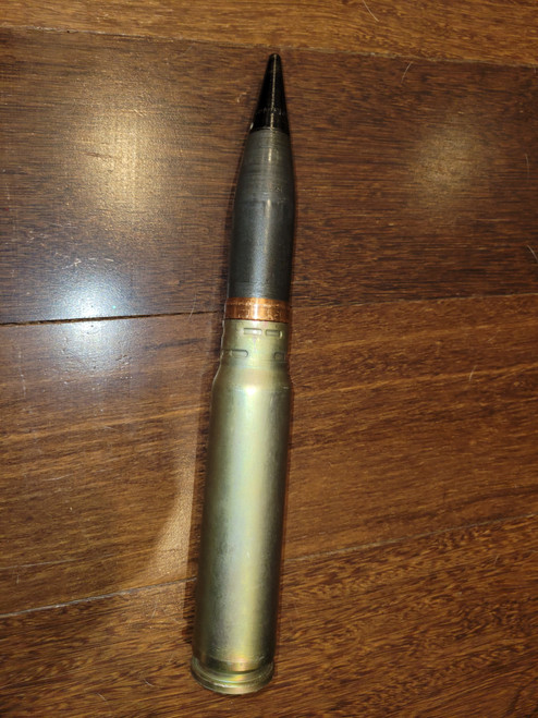 Rando 30mm shell with Ruskiwriting on it paper weight, conversation  piece