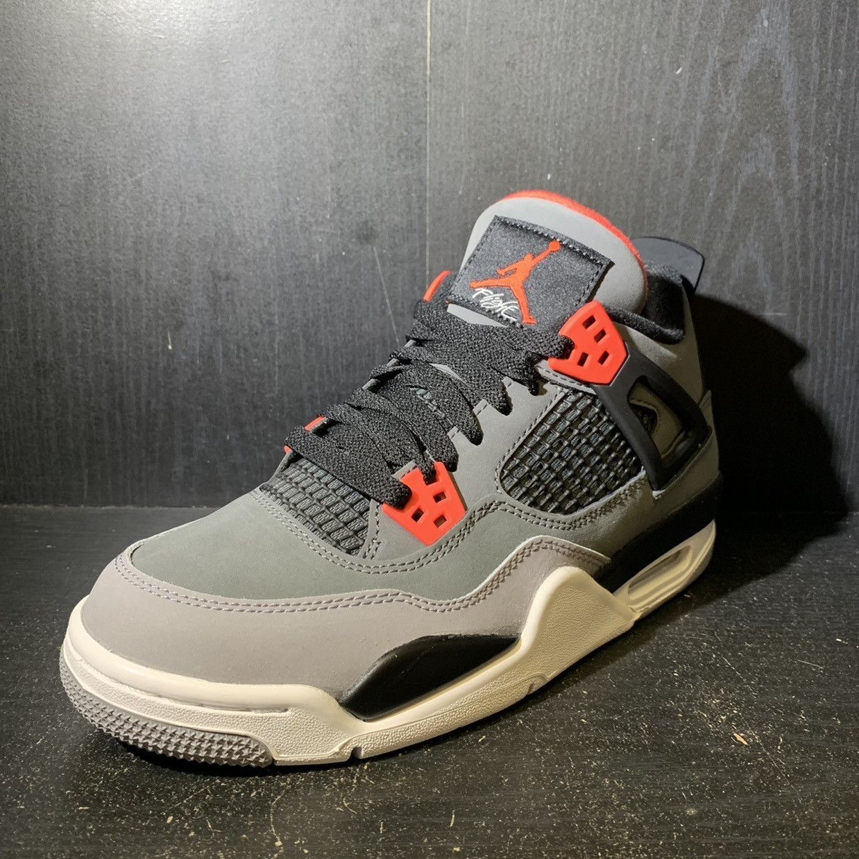grey and orange jordan 4