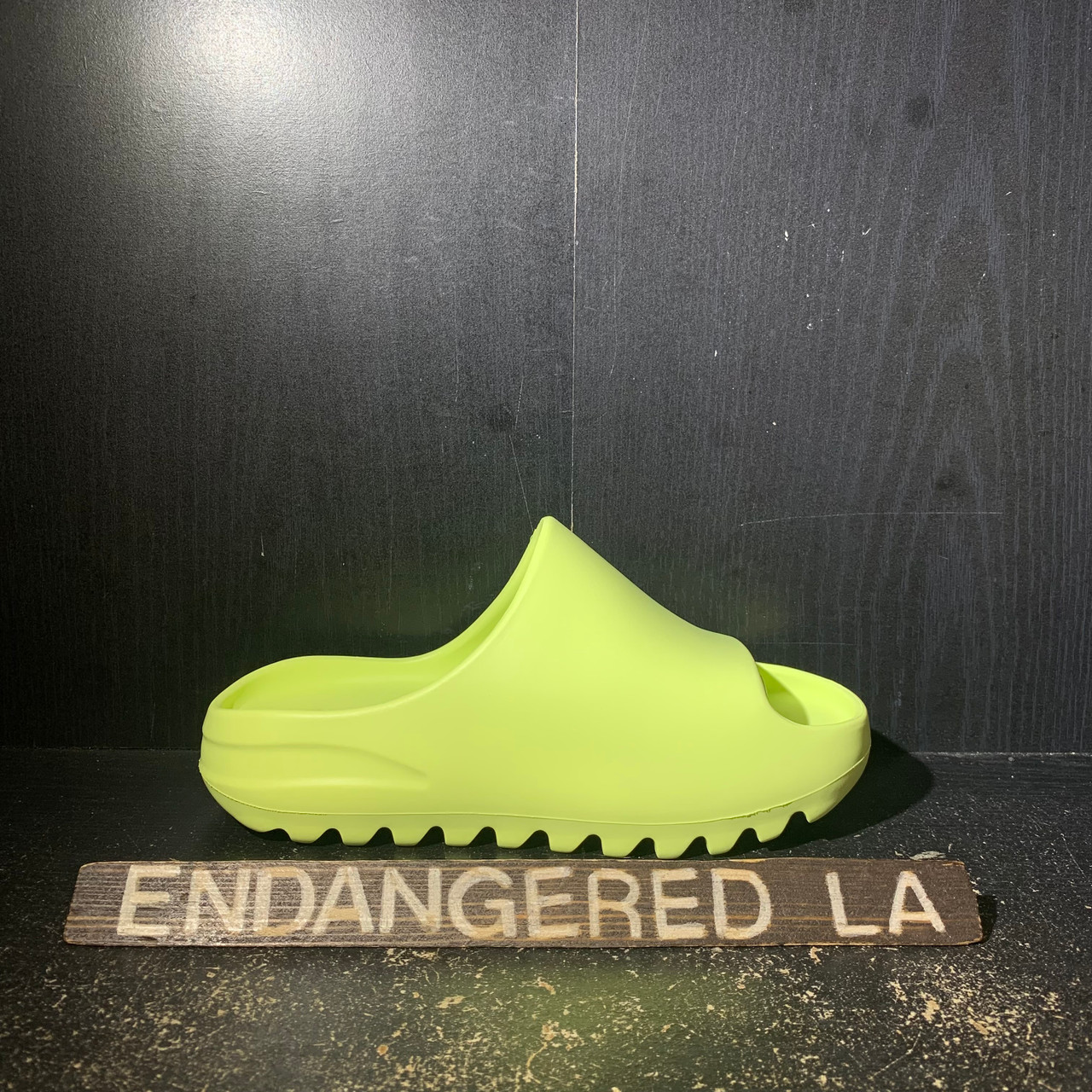 glow green yeezy slides glow in the dark