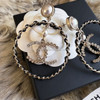 CHANEL 18B Pearls, Strass & Interlaced Leather CC Earrings