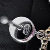 CHANEL 22C Circle CC Drop Earrings